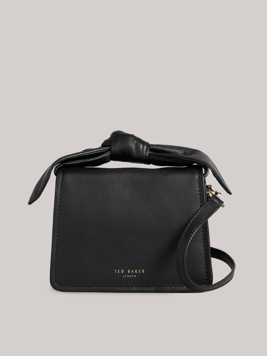 

Ted Baker Black Leather Bucket Sling Bag with Cut Work