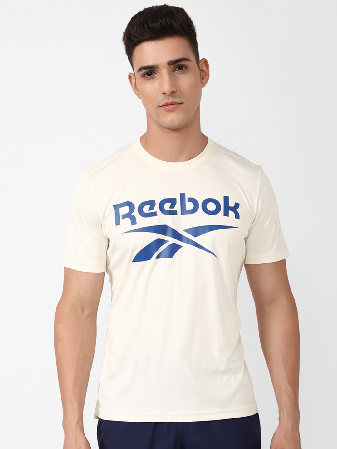 

Reebok Men M Store Staff Brand Logo-Printed T-Shirt, Cream