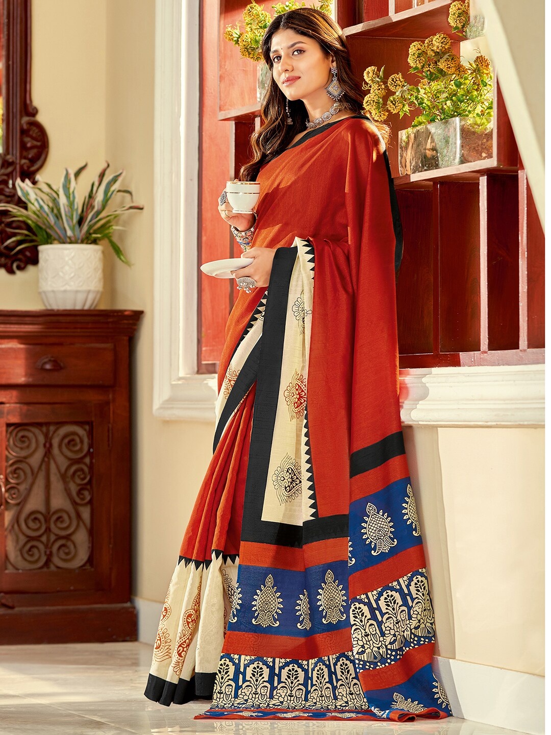 

KALINI Ethnic Motifs Printed Zari Dabu Saree, Rust