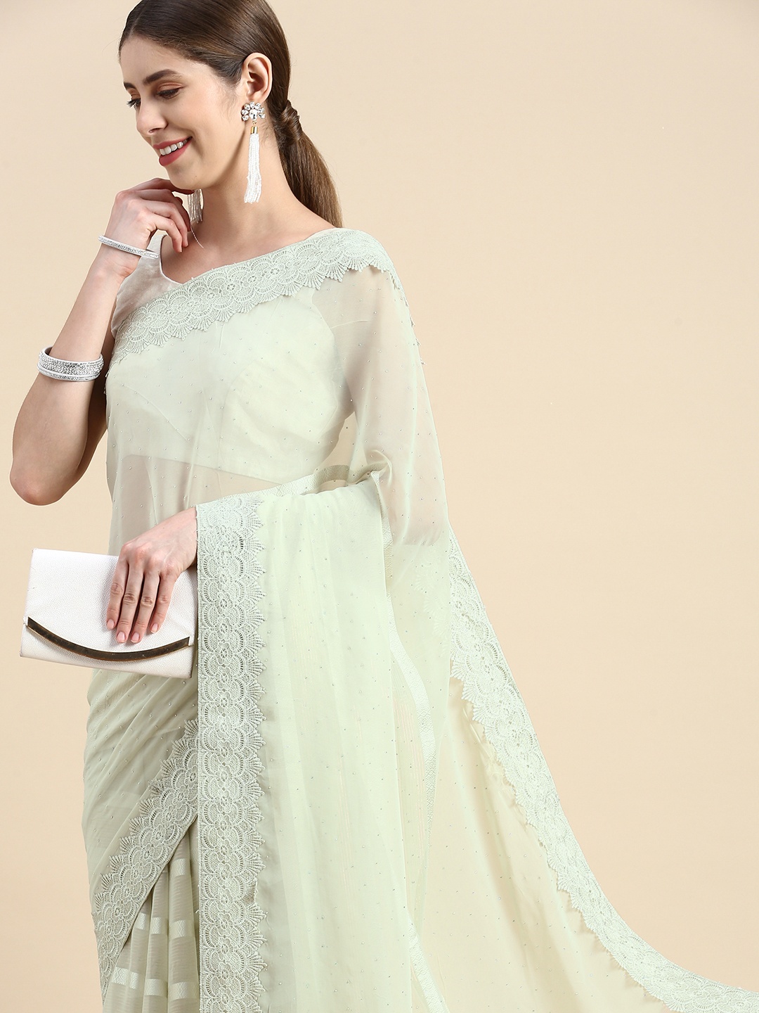 

Pothys Green Woven Design Pure Georgette Saree