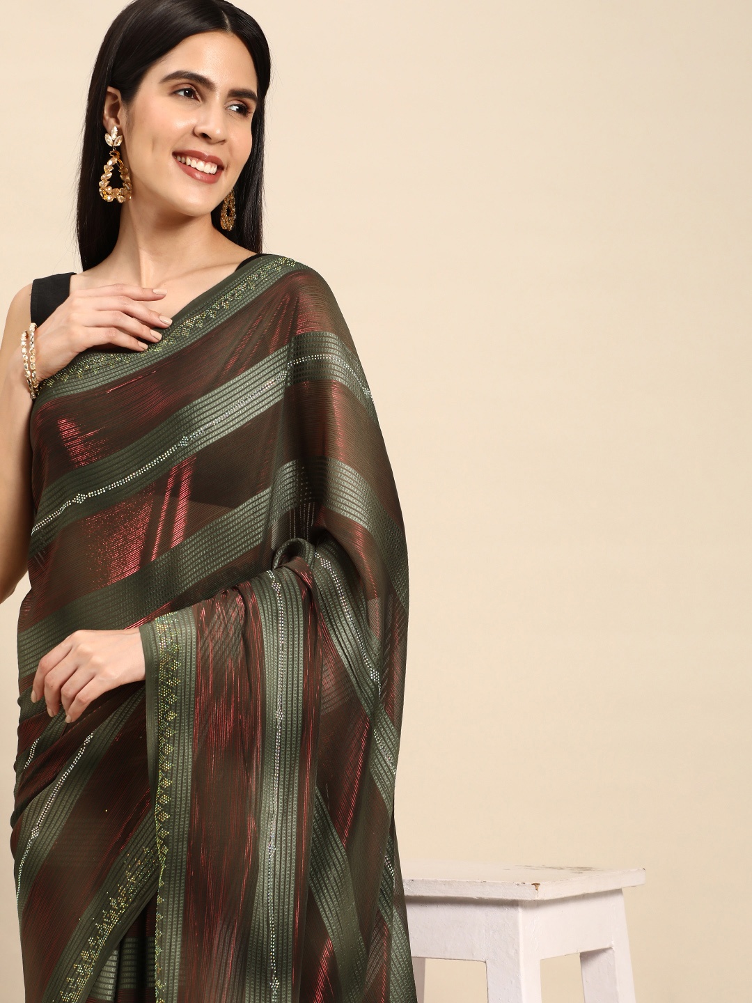 

Pothys Green Striped Pure Georgette Saree