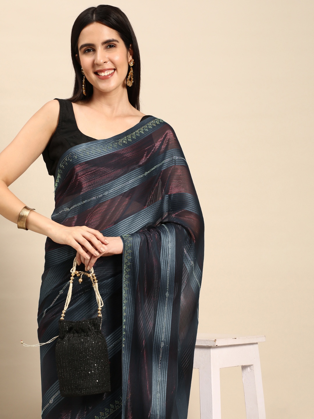 

Pothys Grey & Red Striped Pure Georgette Saree