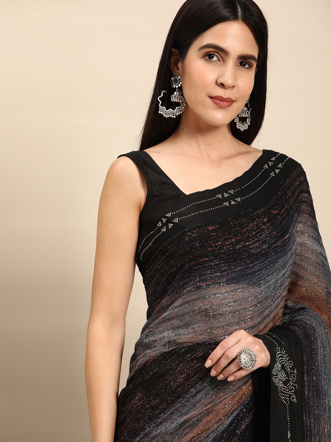 

Pothys Black & Brown Striped Pure Georgette Saree