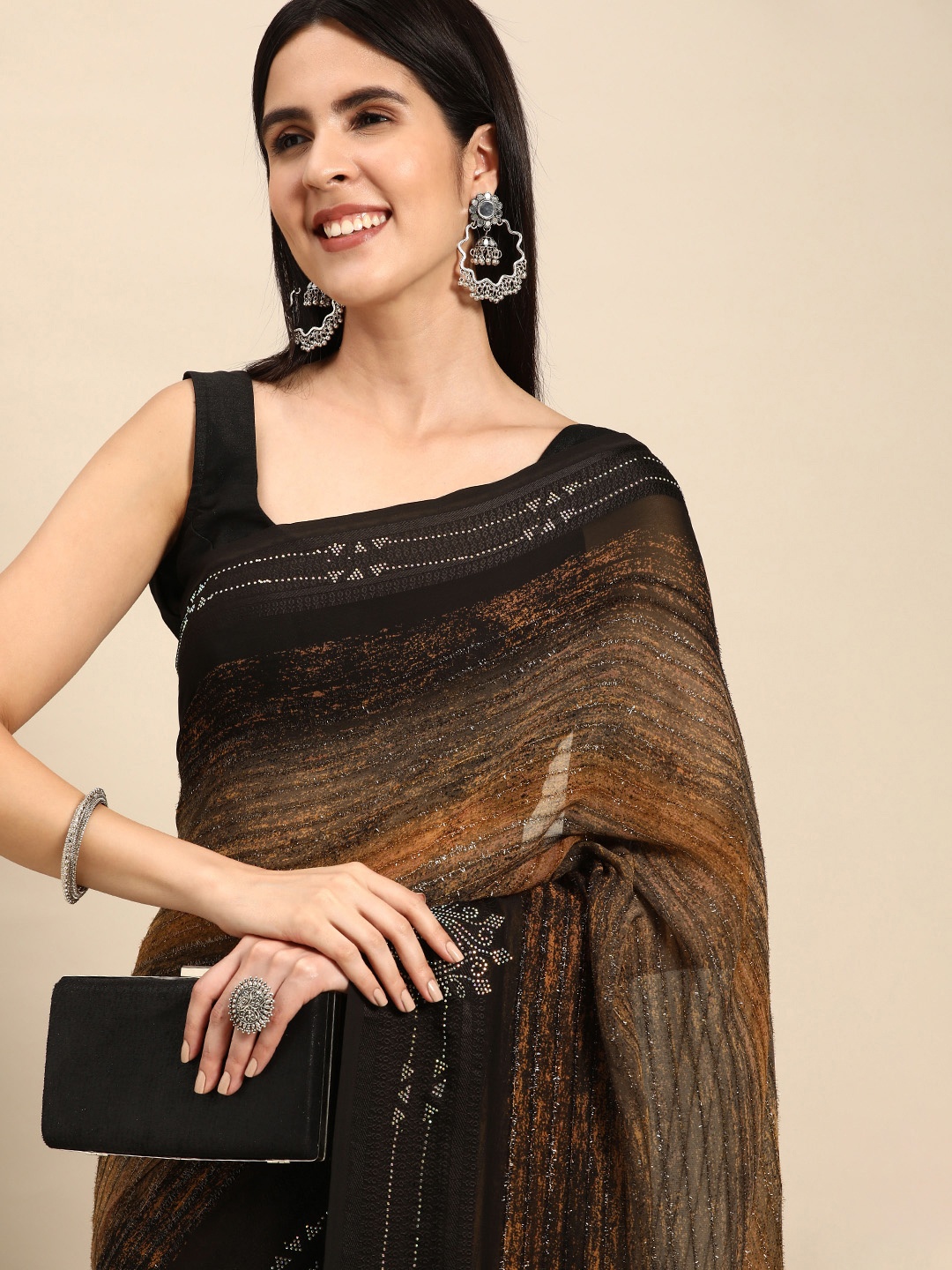 

Pothys Black & Brown Striped Pure Georgette Saree