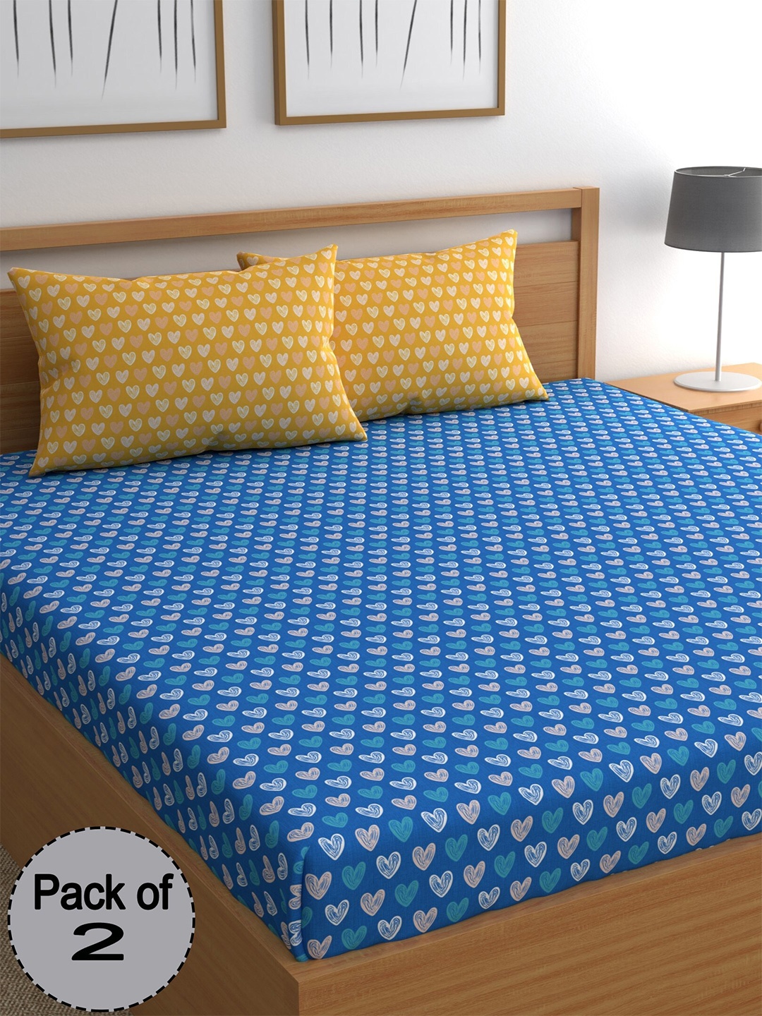 

CHHAVI INDIA Blue & White Printed 210 TC 2 Queen Bedsheet & 4 Pillow Covers