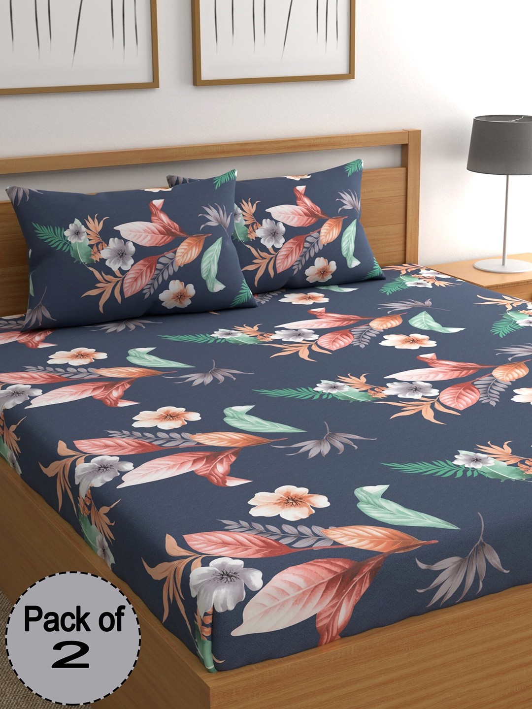 

CHHAVI INDIA Blue & White Floral Printed 210 TC 2 Queen Bedsheet & 4 Pillow Covers