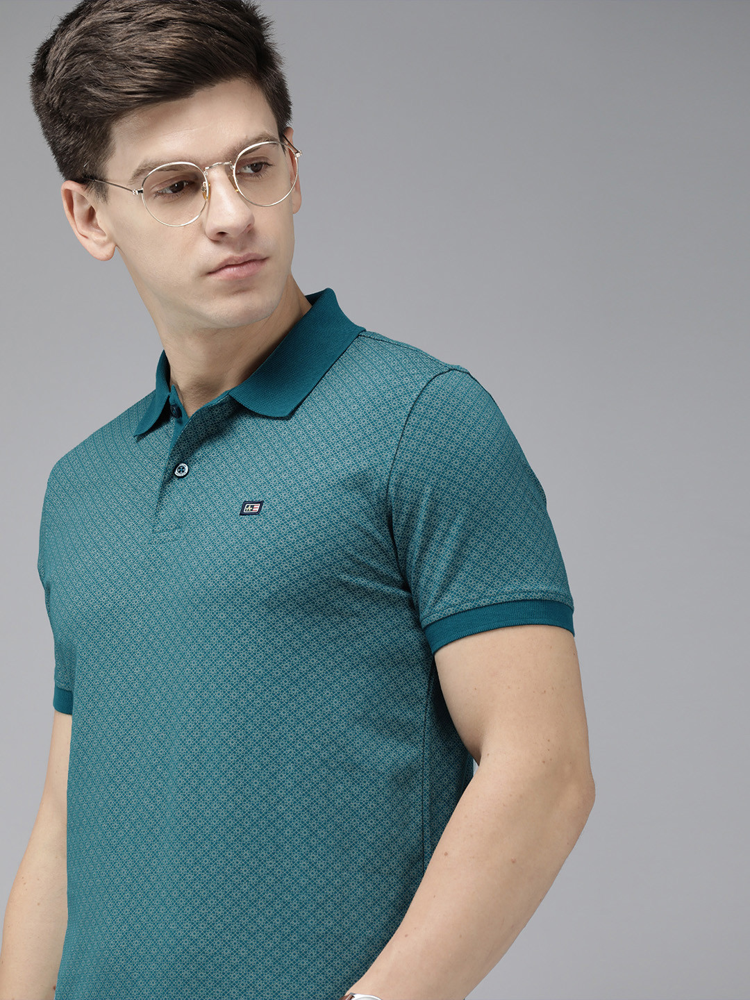 

Arrow Geometric Printed Polo Collar Pure Cotton T-shirt, Teal