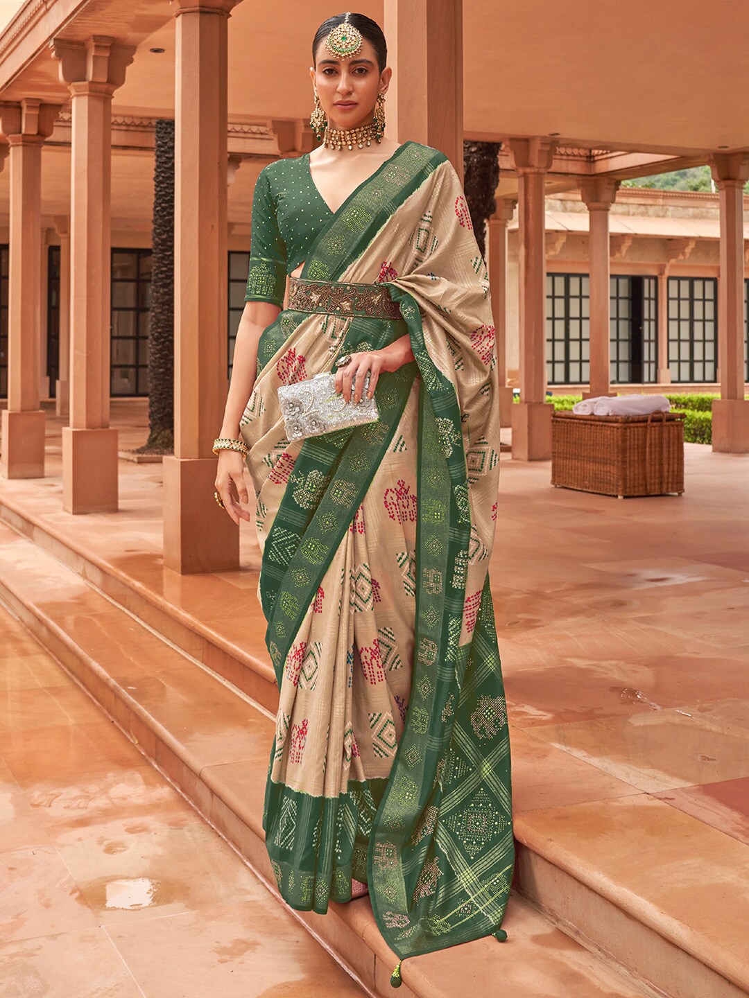 

Anouk Cream-Coloured & Green Ethnic Motifs Printed Zari Patola Saree