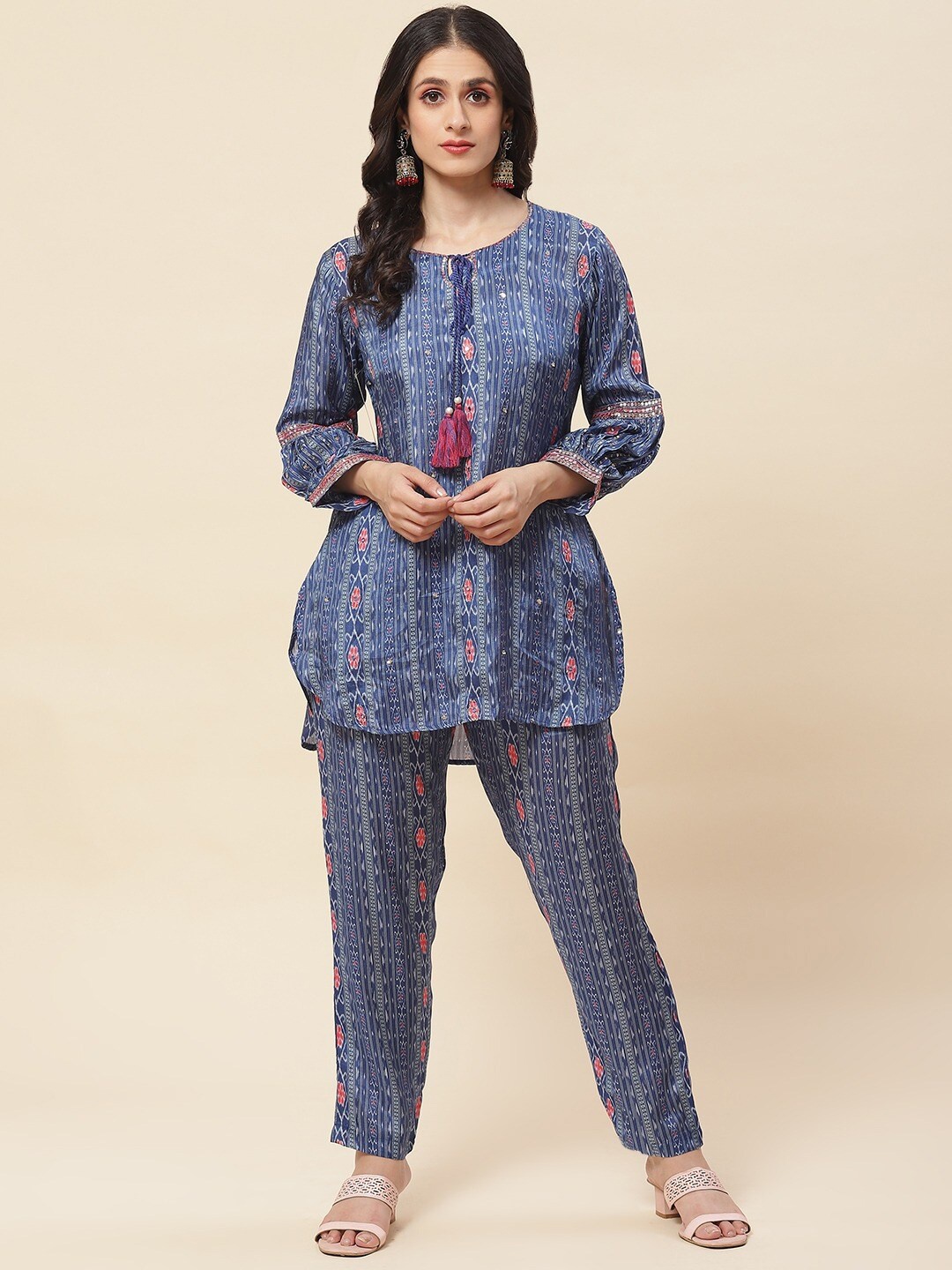 

Meena Bazaar Ethnic Motif Printed Tie Up Neck Kurti With Trousers, Blue