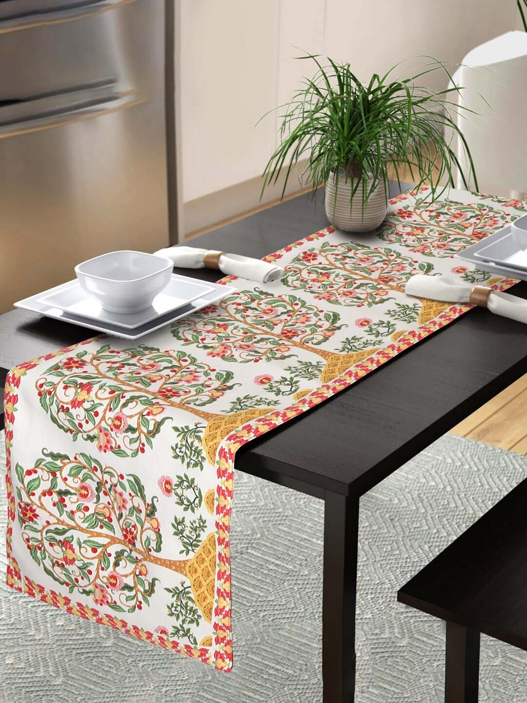 

Lushomes White & Green Ethnic Motif Printed Table Runner