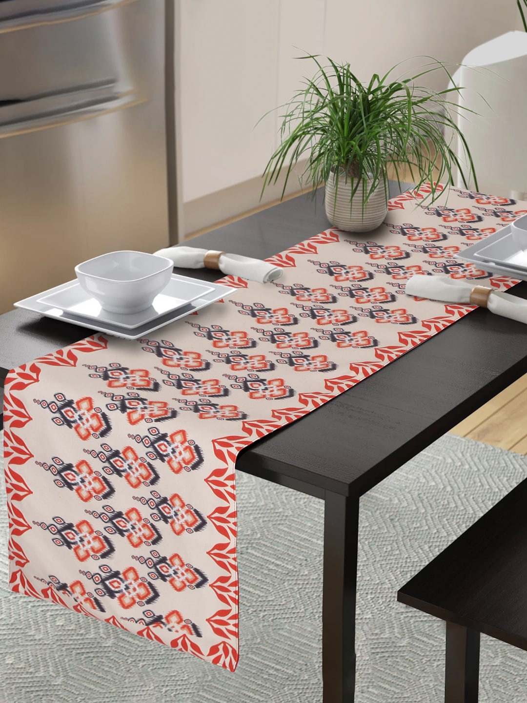 

Alina decor Beige & Orange-Colored Printed Table Runner