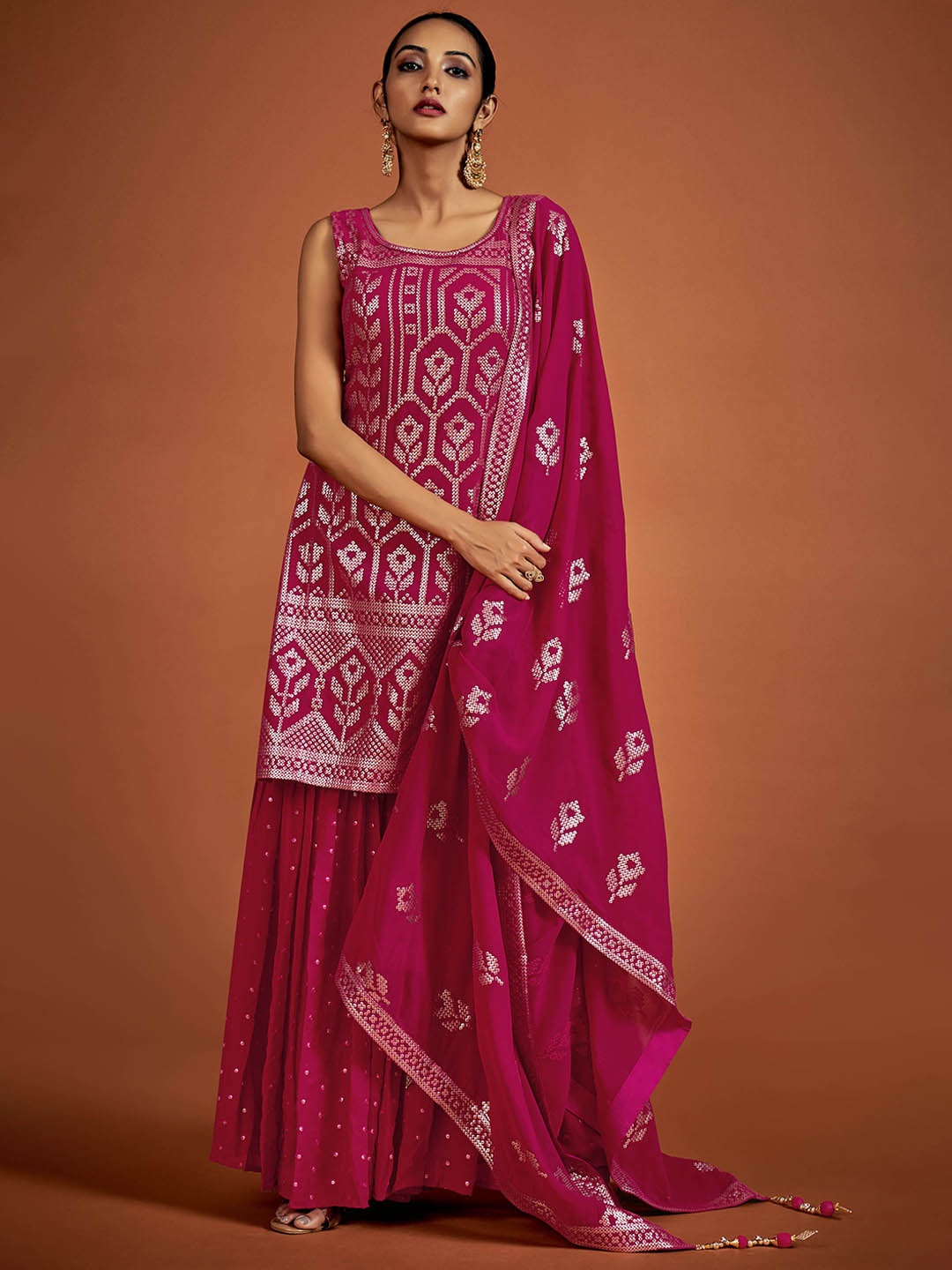 

Fusionic Ethnic Motifs Embroidered Sequined Kurti with Sharara & Dupatta, Magenta