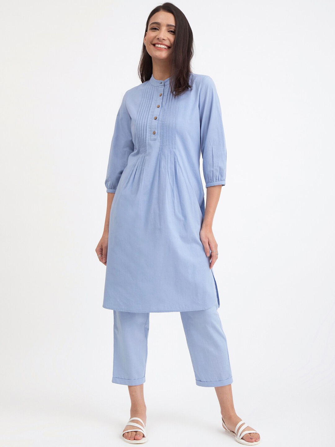 

Pink Fort Band Collar A-Line Kurta With Trousers, Blue