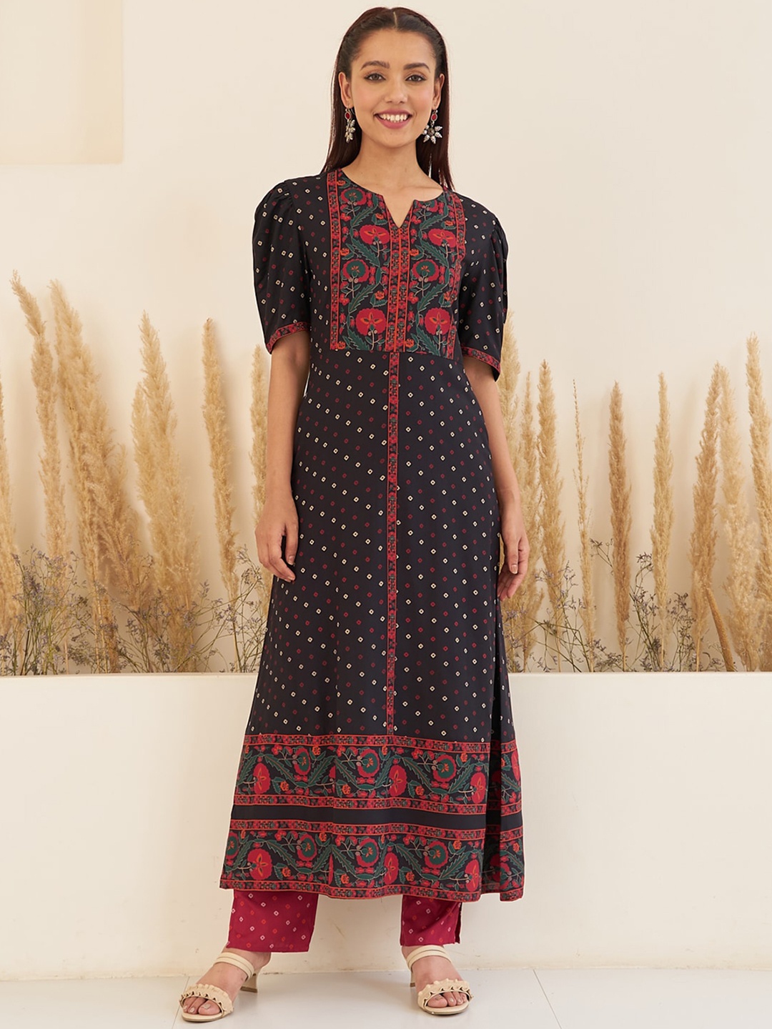 

Rustorange Bandhani Printed Notched Neck Puff Sleeves A-Line Kurta With Trousers, Black