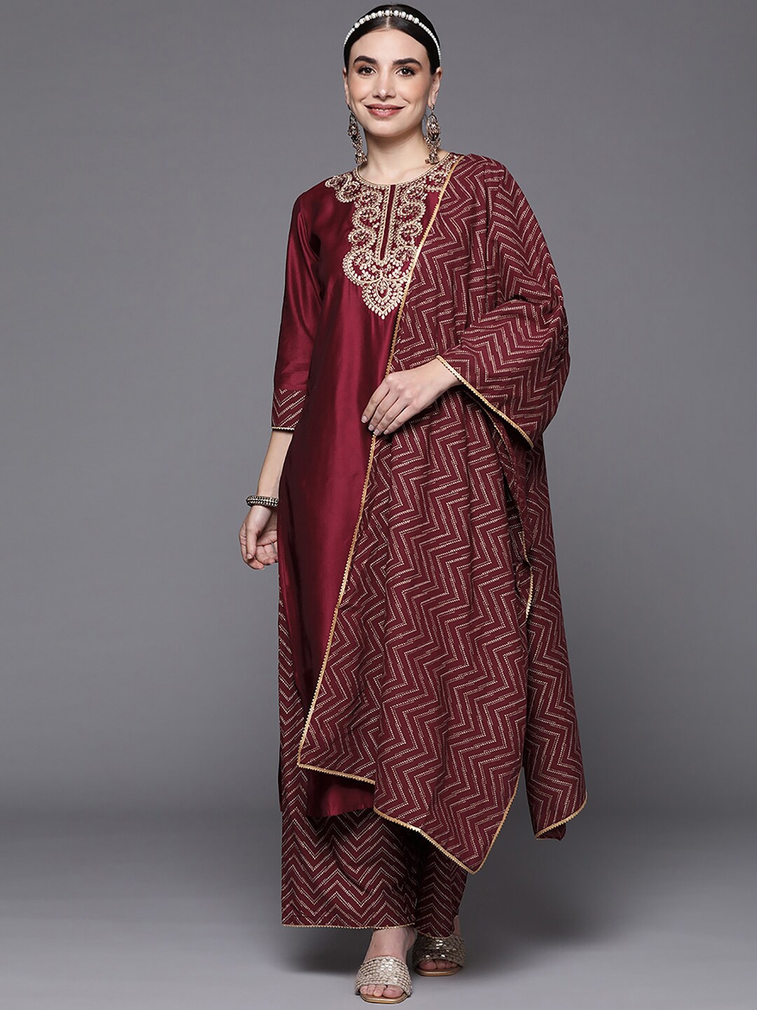 

Indo Era Maroon Ethnic Motifs Embroidered Zari Liva Kurta with Palazzos & Dupatta