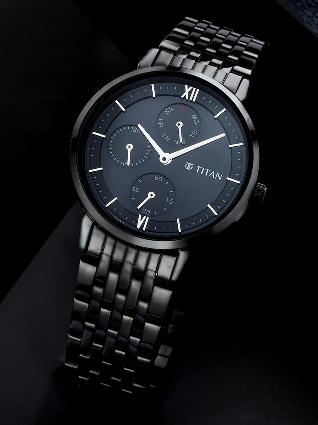

Titan Women Brass Dial & Stainless Steel Bracelet Style Straps Analogue Watch NQ2652NM01, Black