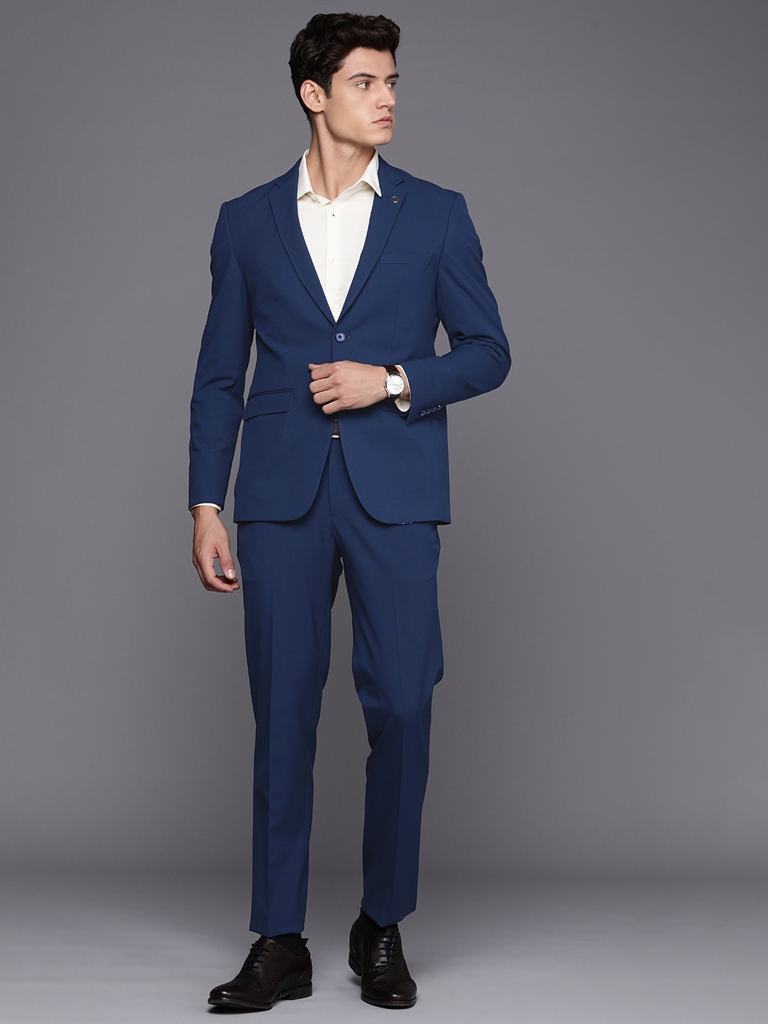 

Peter England Elite Men Solid Two Piece Suit, Blue