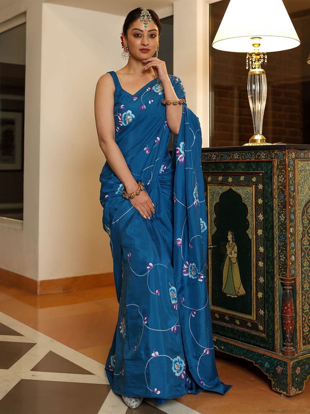 

AACHHO Floral Printed Embellished Saree, Blue