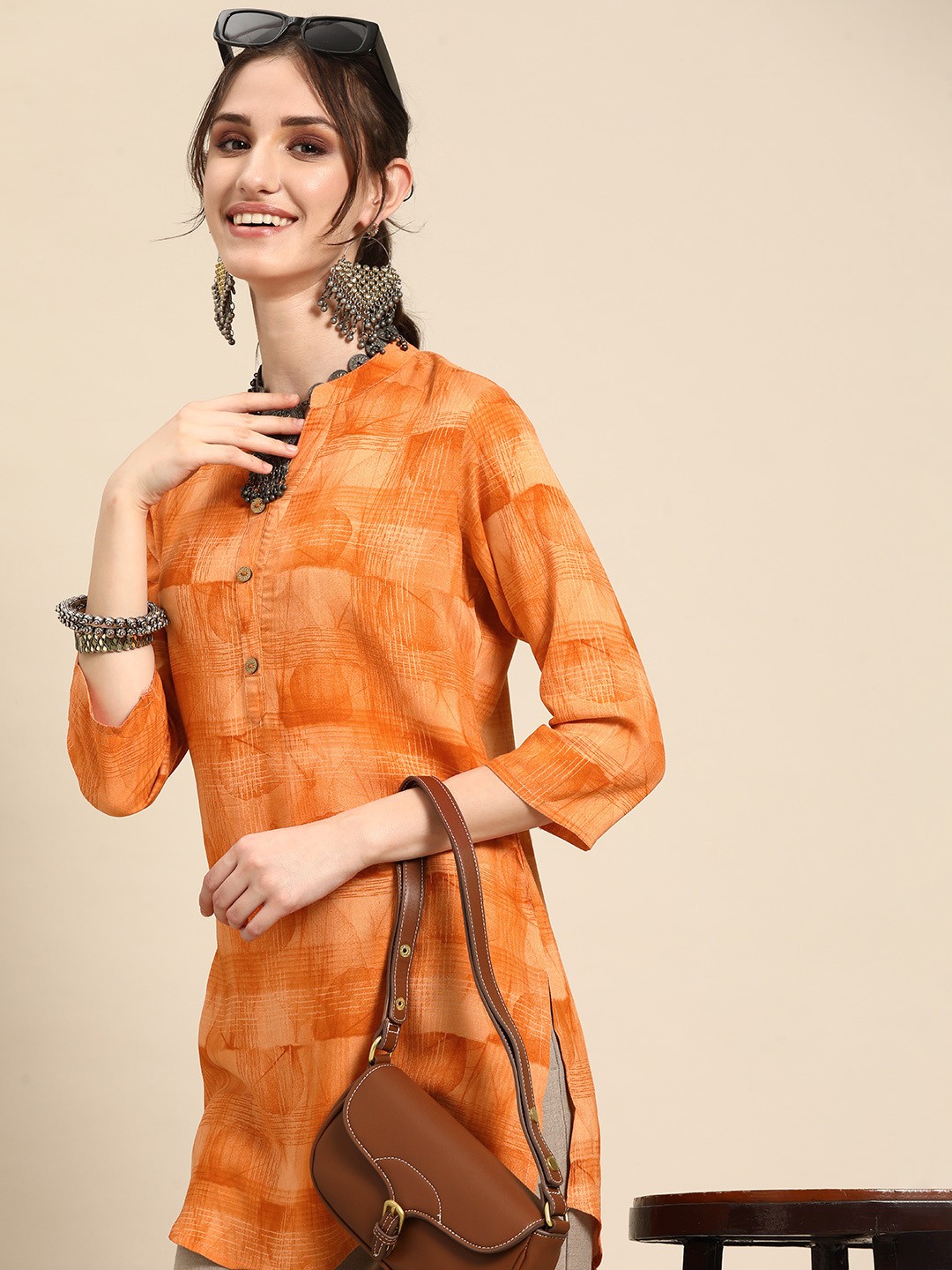 

Sangria Abstract Printed Mandarin Collar Kurti, Orange