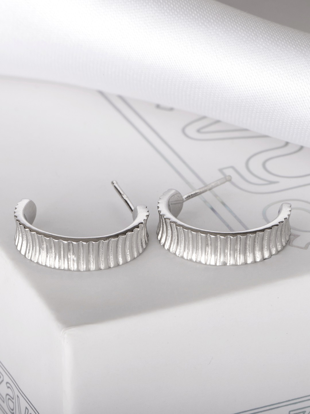 

Zavya Sterling Silver Circular Half Hoop Earrings