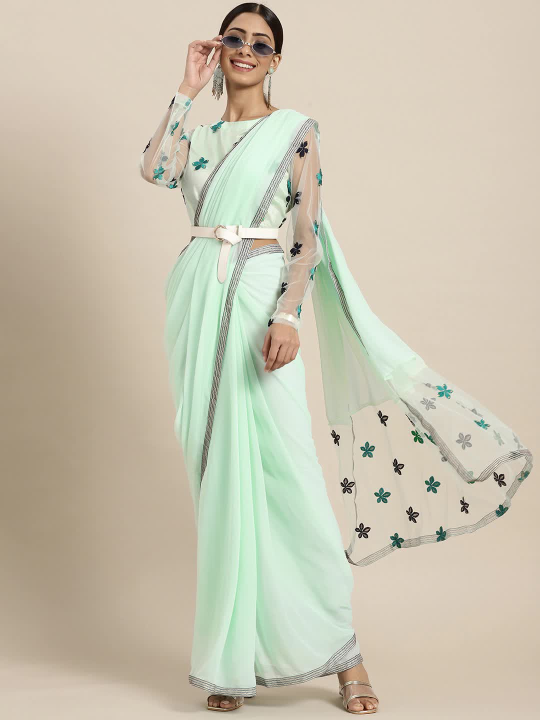 

Sangria Sea Green & Black Floral Embroidered Beads and Stones Saree