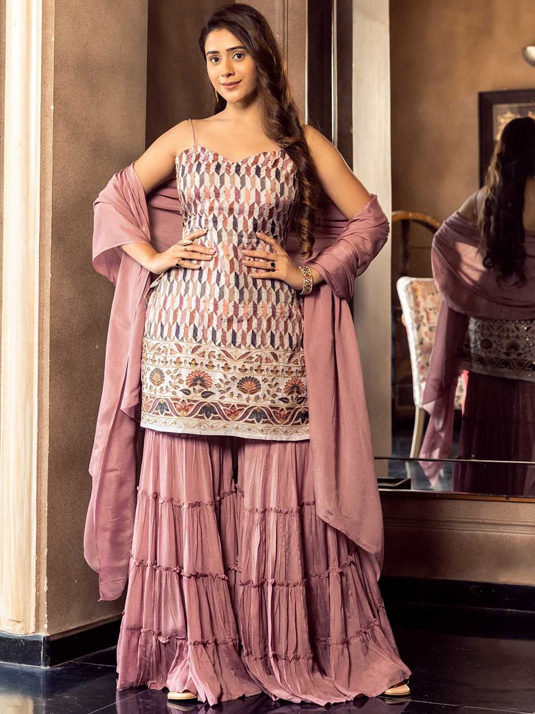 

AACHHO Women Mauve Floral Printed Regular Kurta with Sharara & With Dupatta