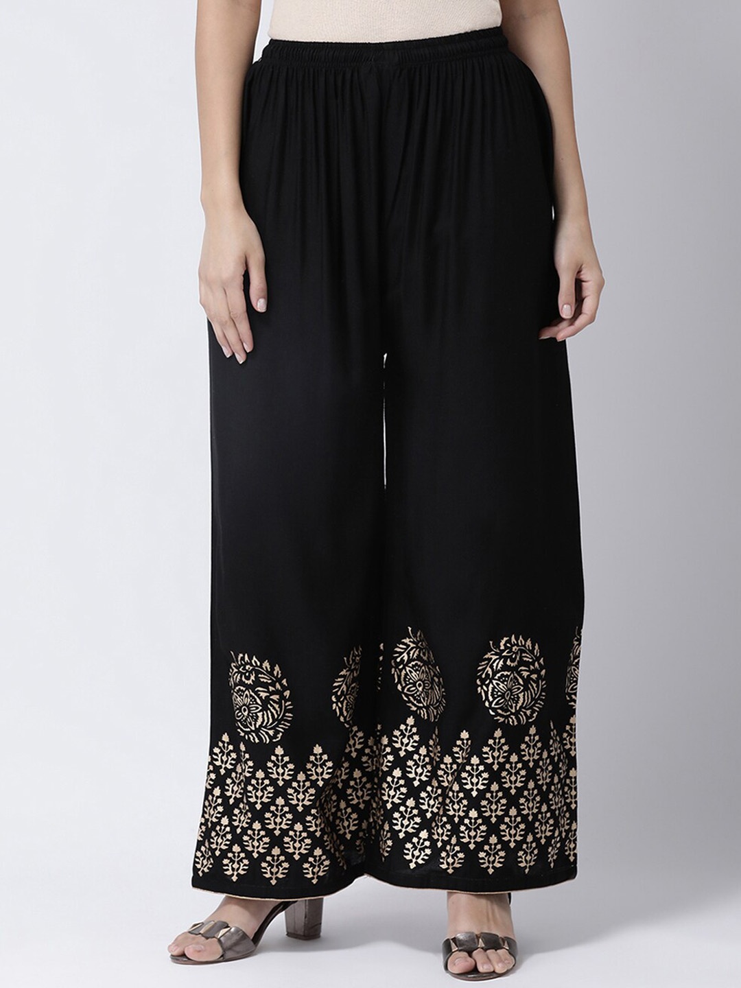 

Charitra Women Ethnic Motifs Printed Flared Cotton Palazzos, Black
