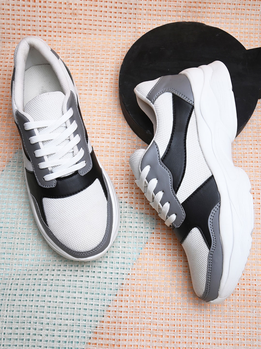 

Roadster Lifestyle Co. Women White And Grey Colourblocked Lightweight Sneakers