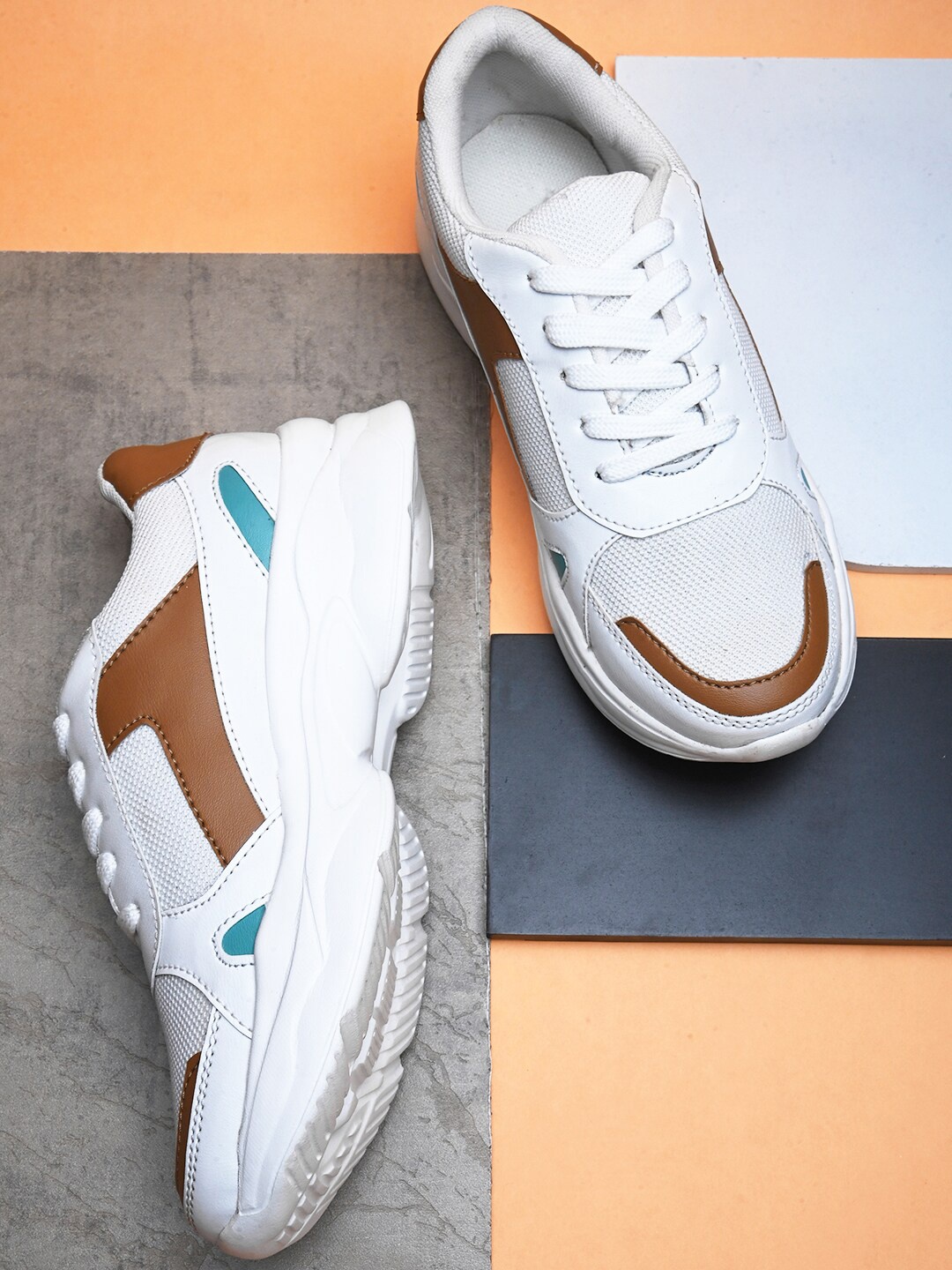 

Roadster Lifestyle Co. Women White And Tan brown Colourblocked Lightweight Sneakers