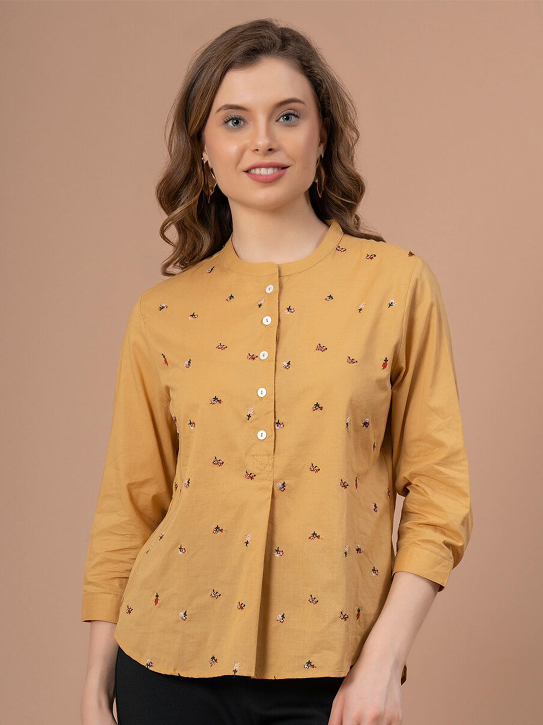 

Mode by Red Tape Mustard Embroidered Floral Printed Cotton Top