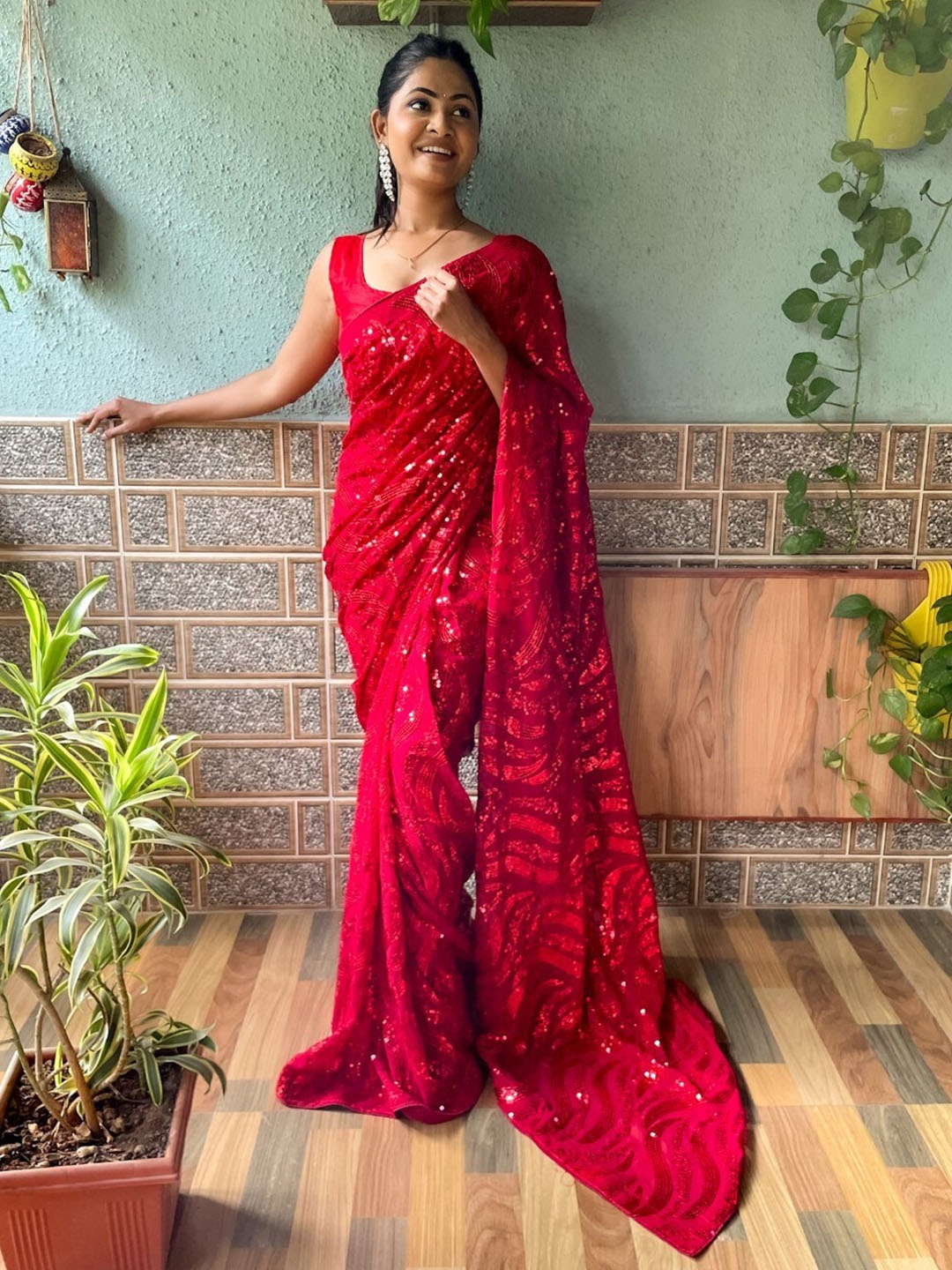 

Mitera Red Sequinned Poly Georgette Saree