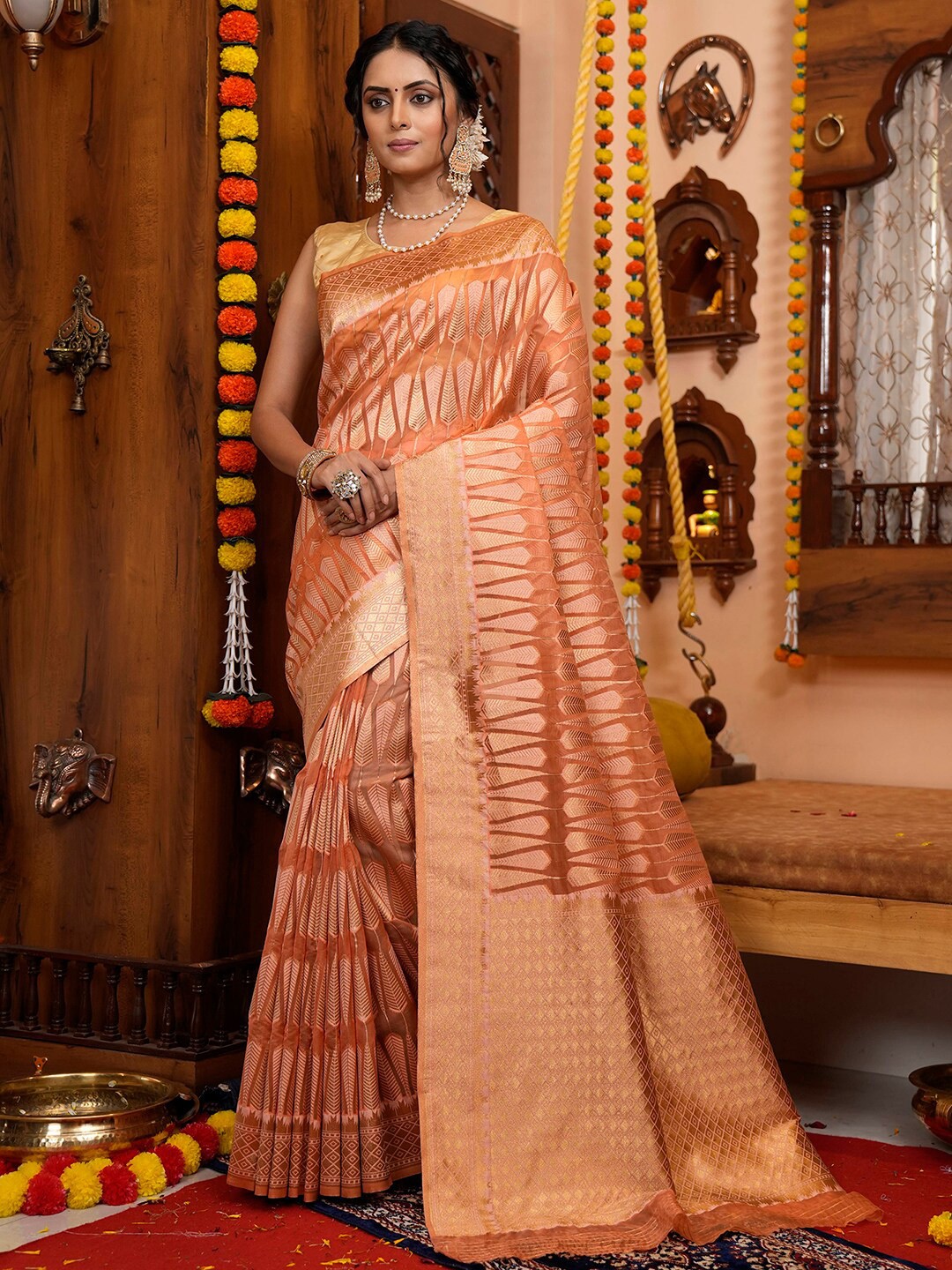

Satrani Orange & Gold-Toned Ethnic Motifs Woven Design Zari Banarasi Saree