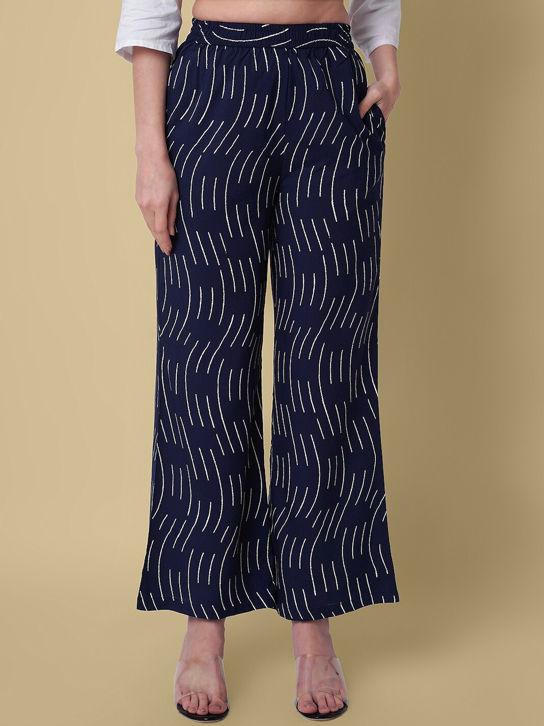 

DAEVISH Women Geometric Printed Smart Loose Fit Easy Wash Flared Trousers, Navy blue