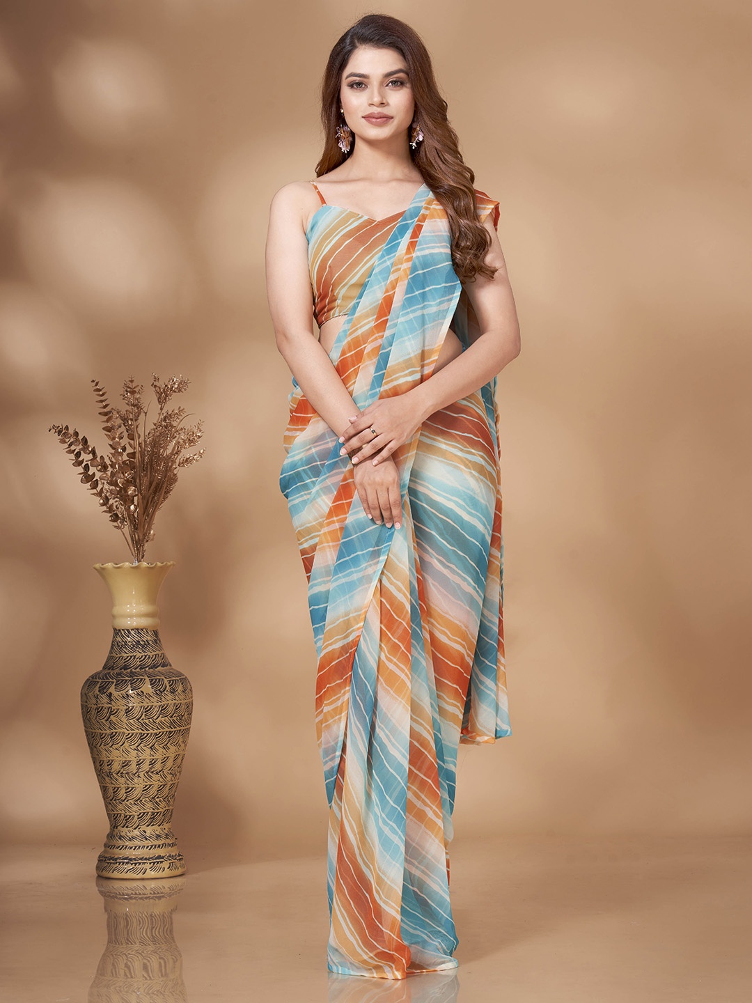 

Tikhi Imli White & Orange Ready To Wear Saree