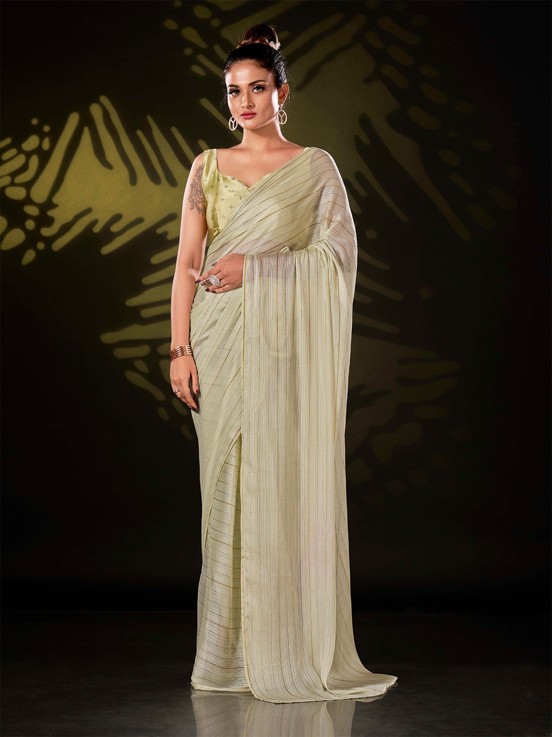 

Tikhi Imli Cream-Coloured Striped Ready to Wear Saree