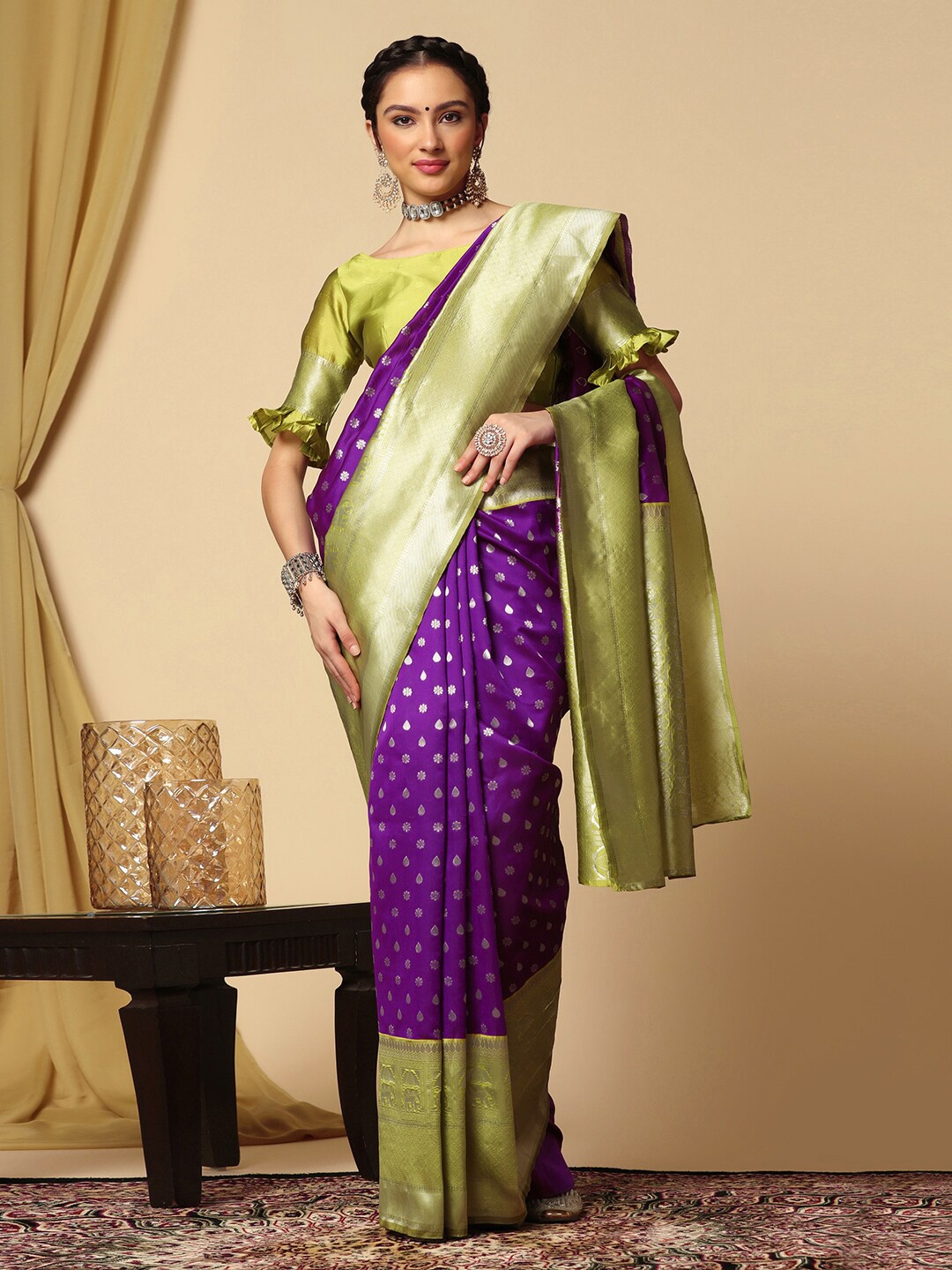 

Mitera Purple & Green Ethnic Motif Woven Design Zari Banarasi Saree