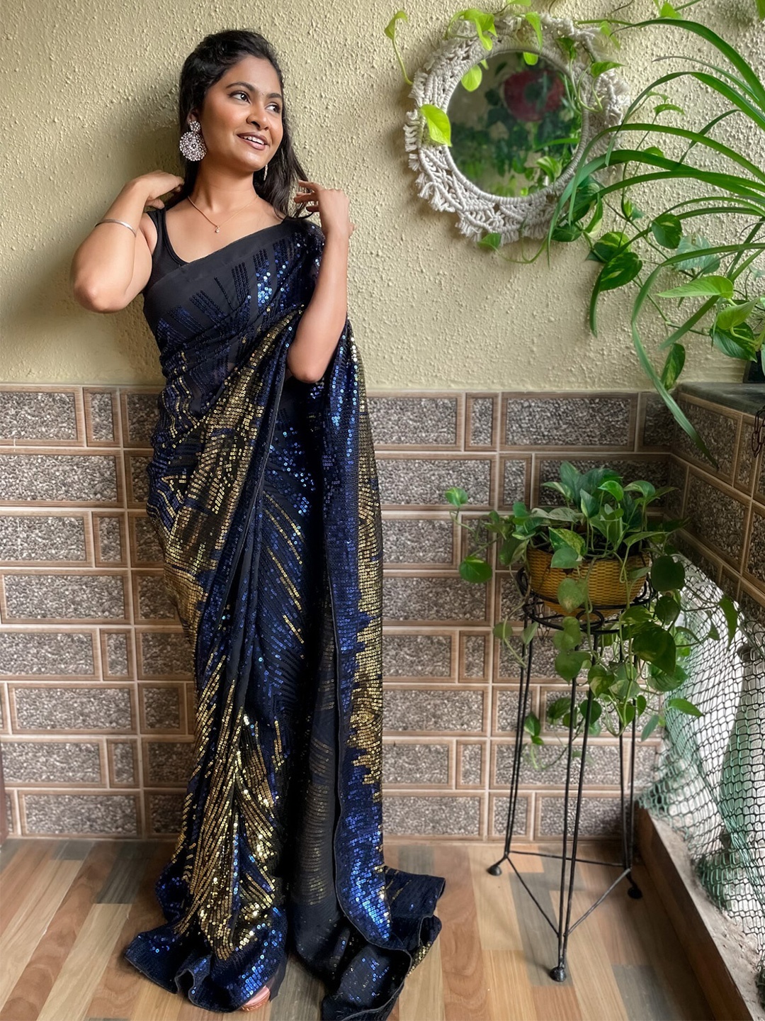 

Mitera Blue Embellished Poly Georgette Saree
