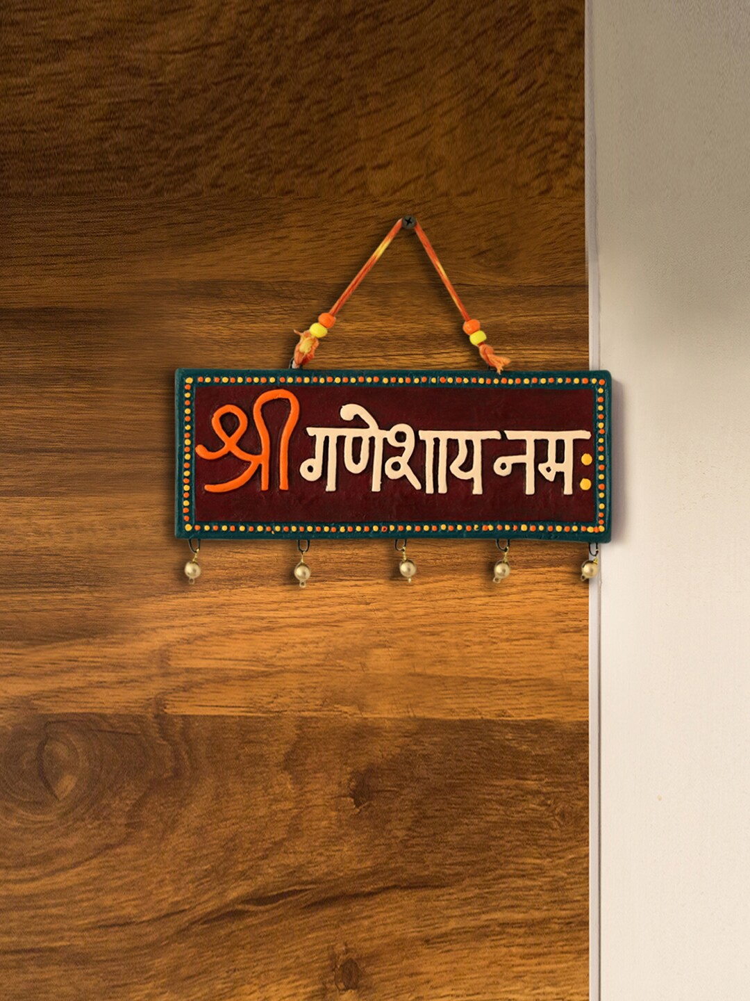 

ExclusiveLane Maroon & Off White Shree Ganeshay Namah Printed Terracotta Wall Hanging