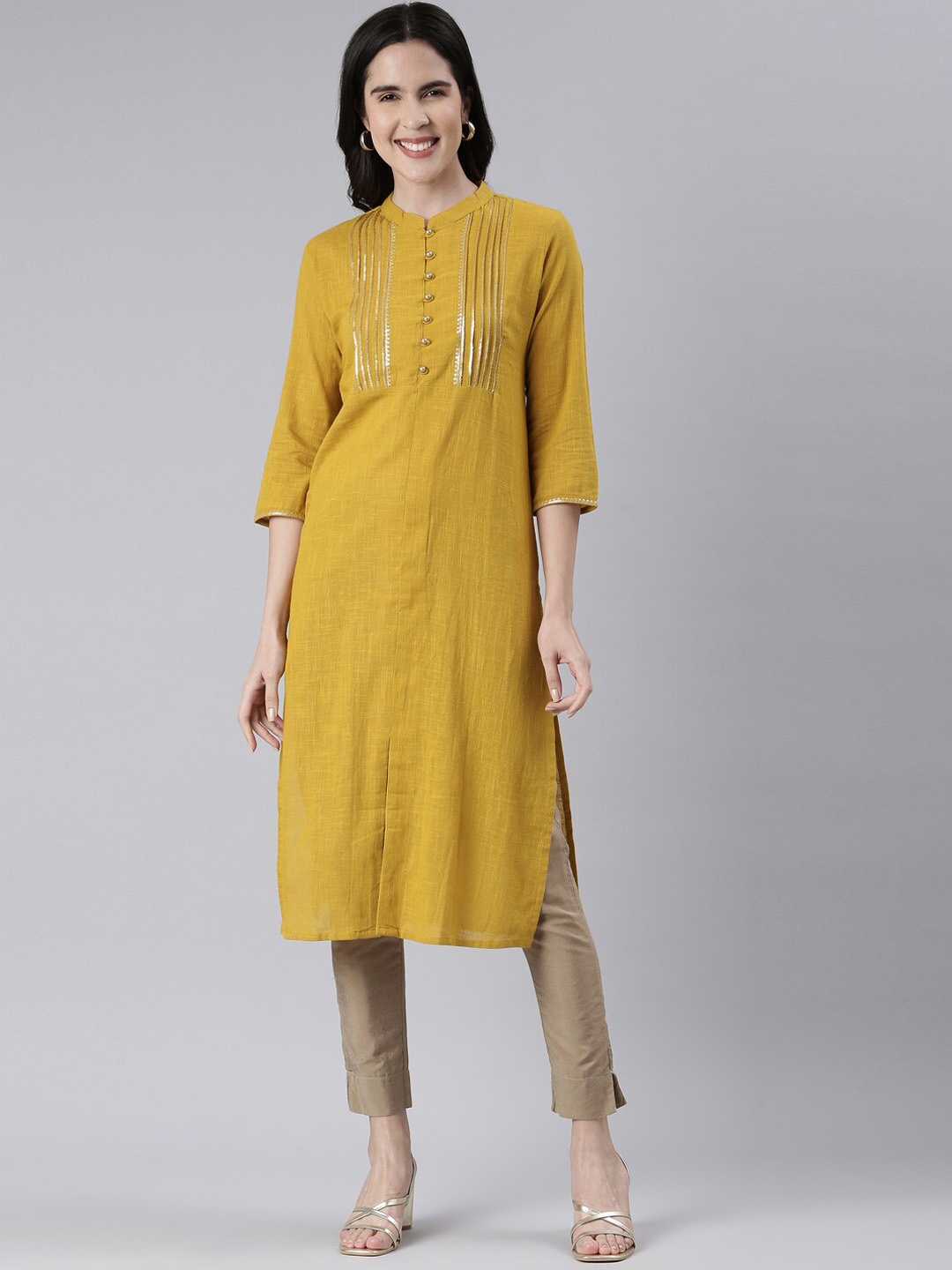 

Neerus Geometric Yoke Design Sequinned Cotton Kurta, Mustard