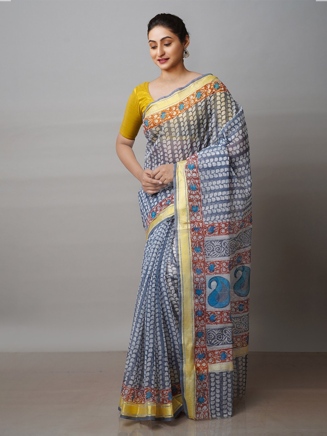 

Unnati Silks Ethnic Motifs Zari Pure Cotton Kota Saree, Grey