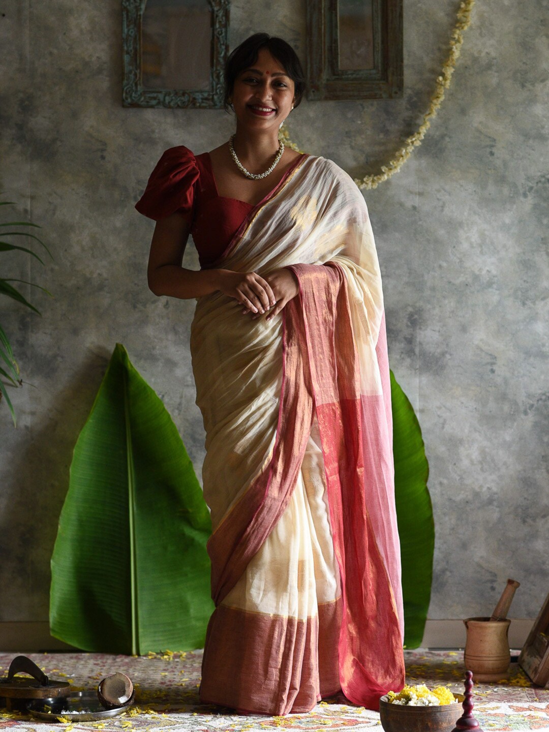 

Suta White & Red Zari Detailed Saree