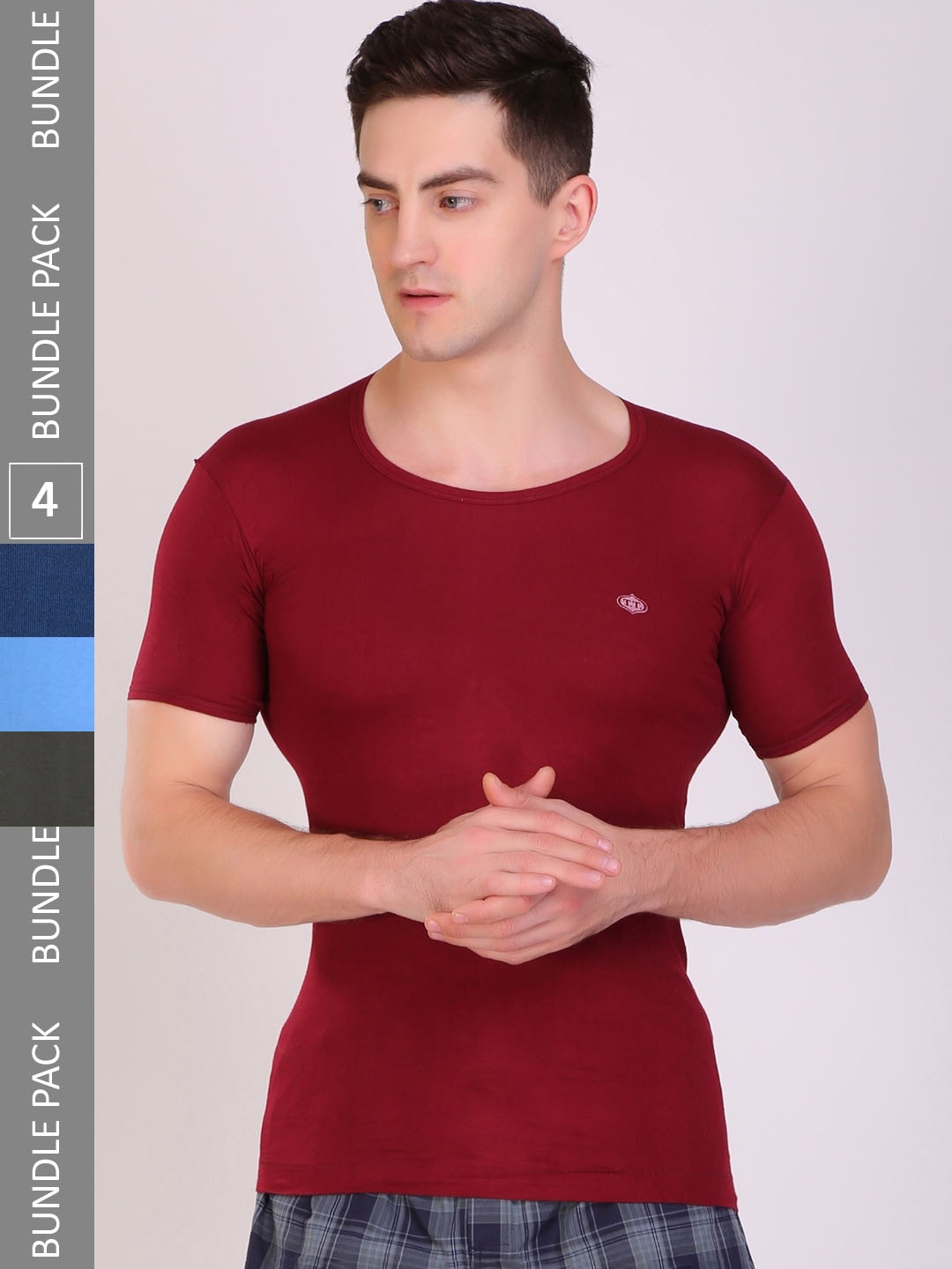 

T.T. Men Pack of 4 Titanic Pure Cotton Solid Dyed Assorted Basic Vests