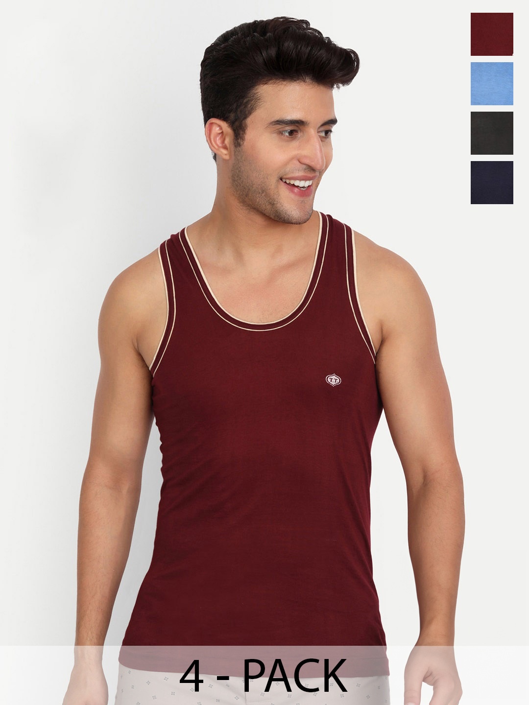 

T.T. Titanic Piping Dyed Pure Cotton Pack Of 4 Assorted Basic Vests