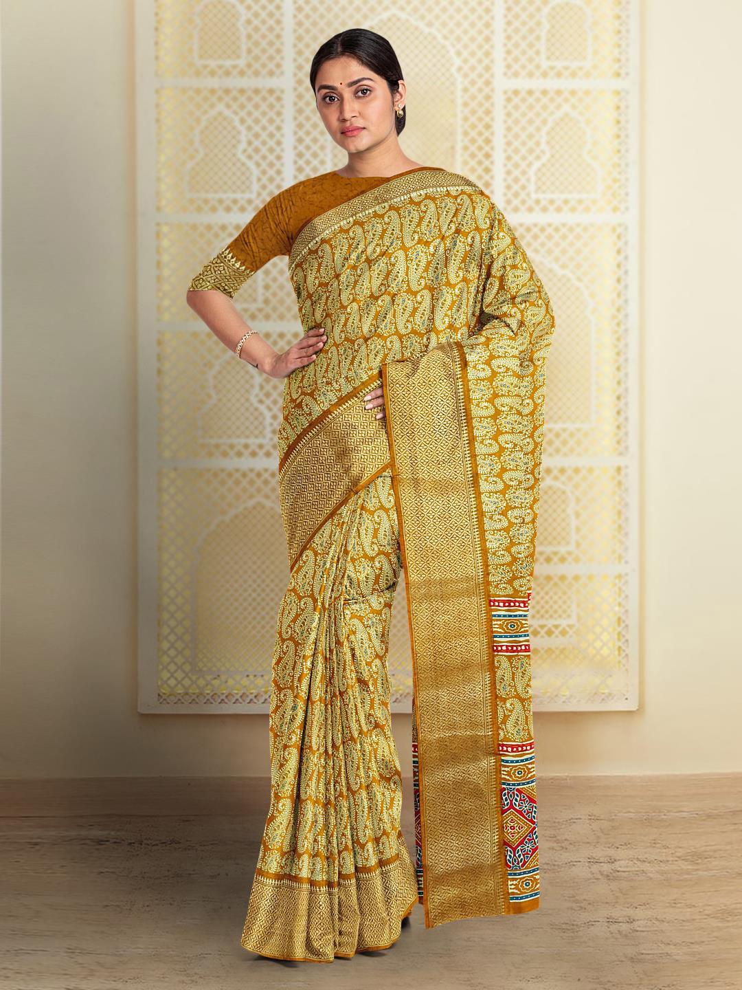 

Kalamandir Paisley Printed Silk Blend Saree, Mustard