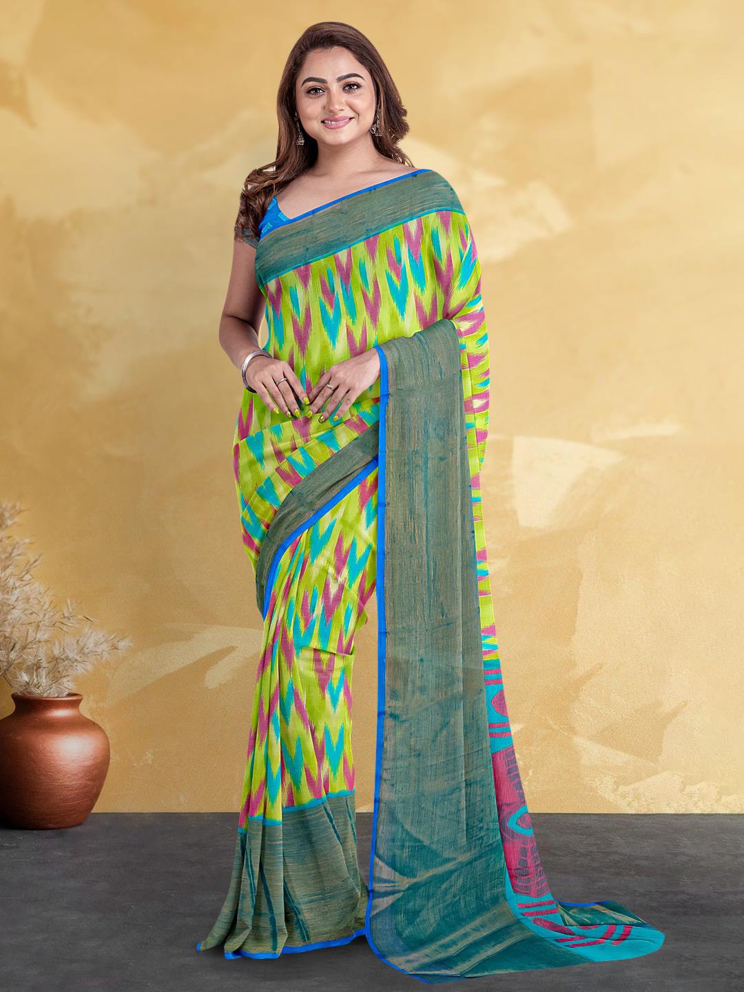 

Kalamandir Abstract Printed Ikat Saree, Green