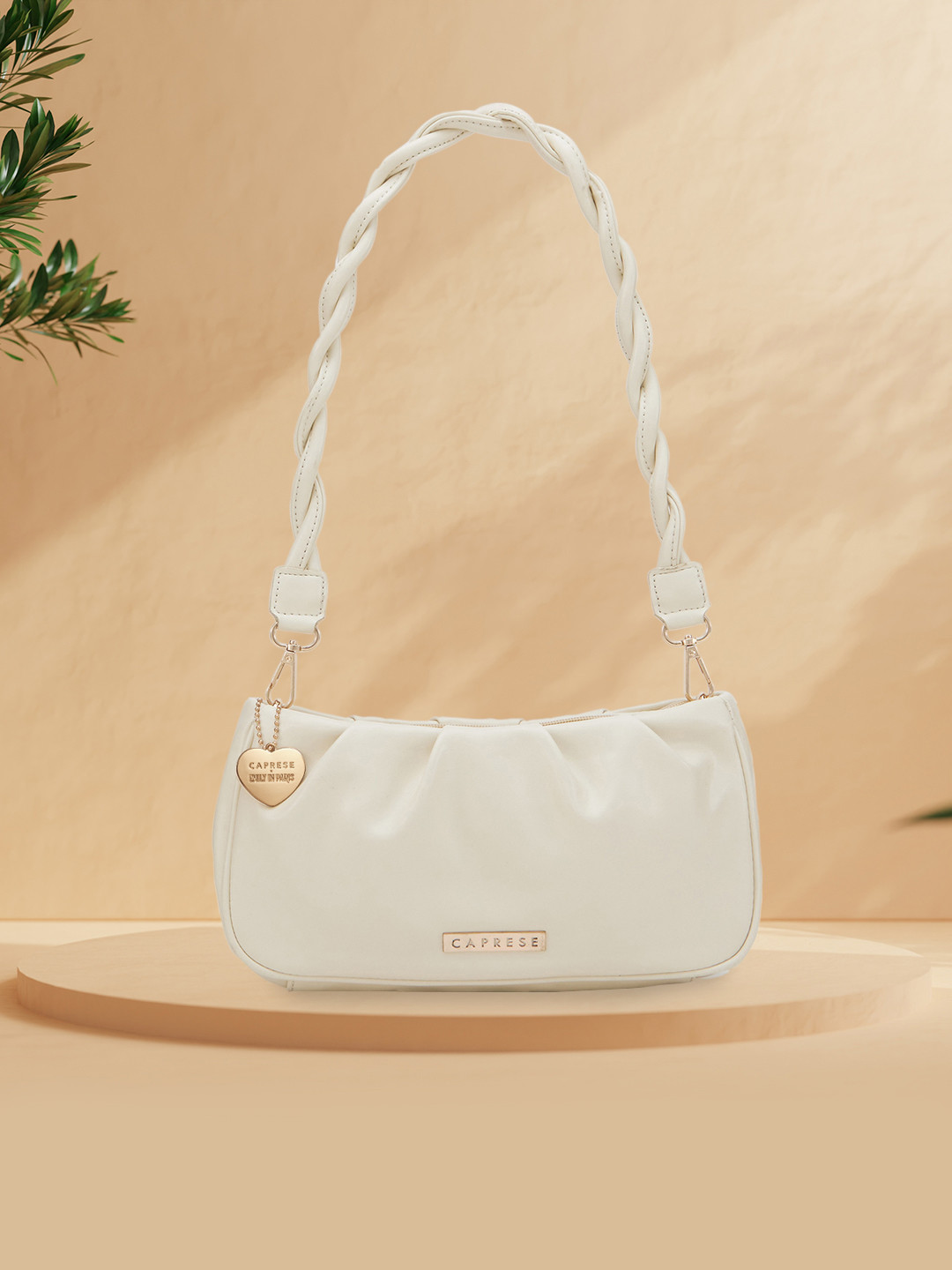 

Caprese Emily in Paris Textured Structured Sling Bag, Green