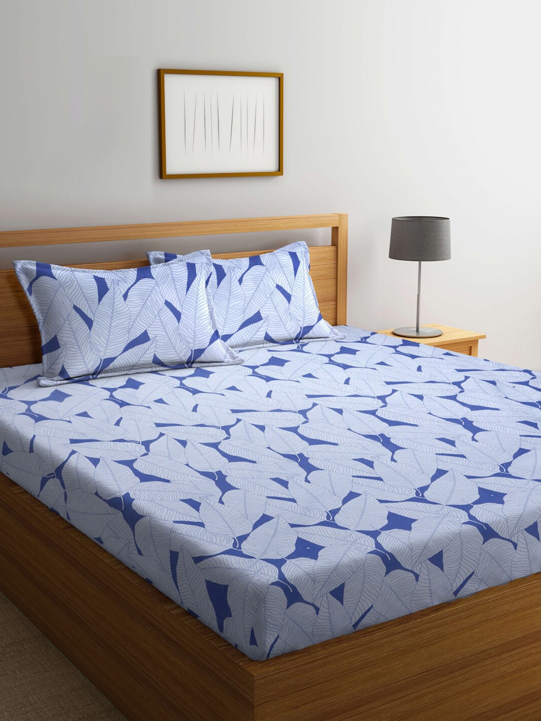 

Arrabi Blue Leaf Printed 300 TC Fitted King Bedsheet With 2 Pillow Covers