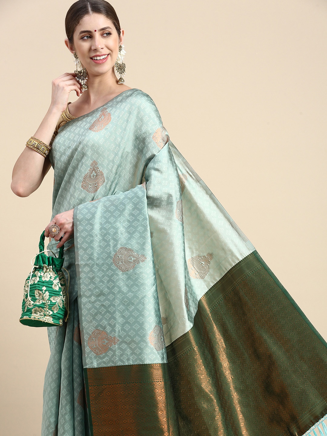 

Pothys Green & Blue Woven Design Jute Silk Saree