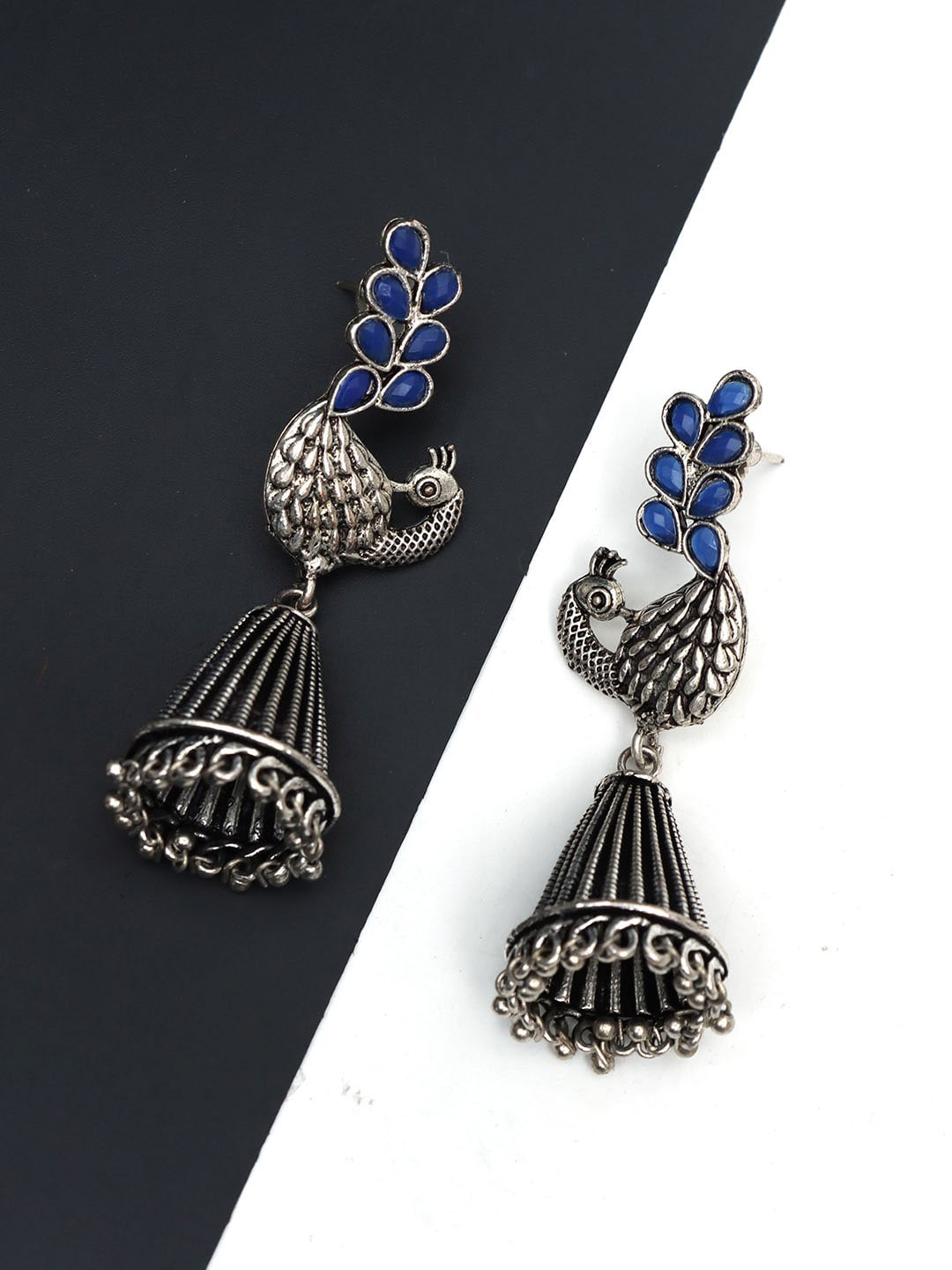 

Ozanoo Silver Plated Stone Studded Oxidised Jhumkas Earrings