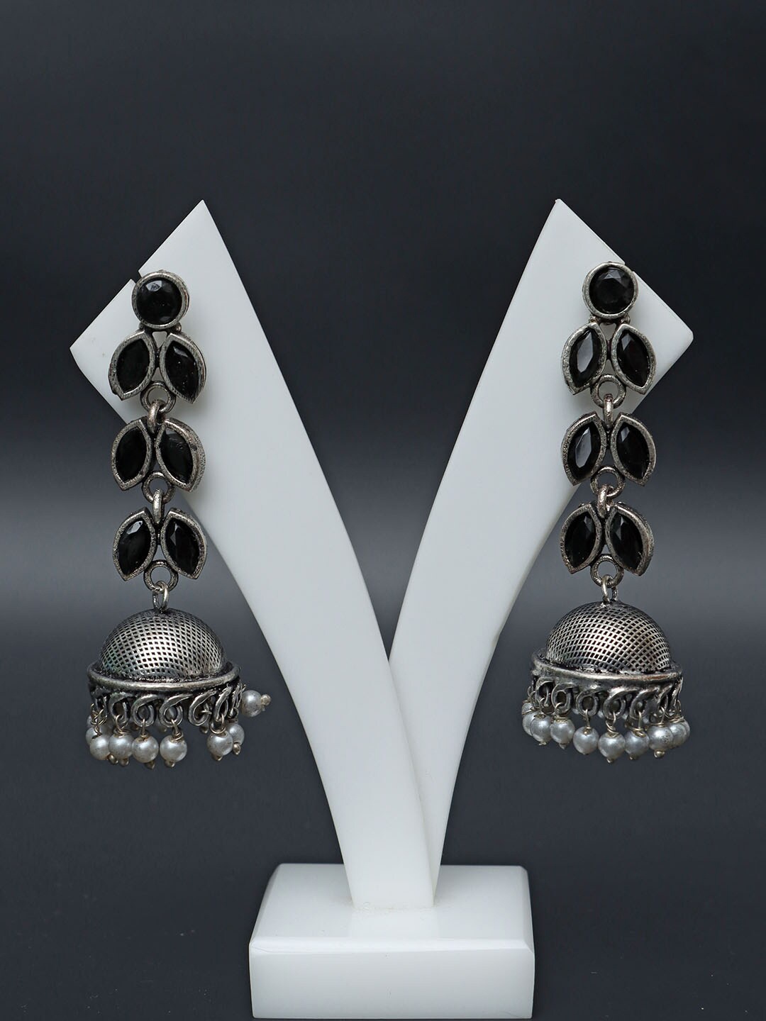 

Ozanoo Silver Plated Stone Studded Oxidised Jhumkas Earrings